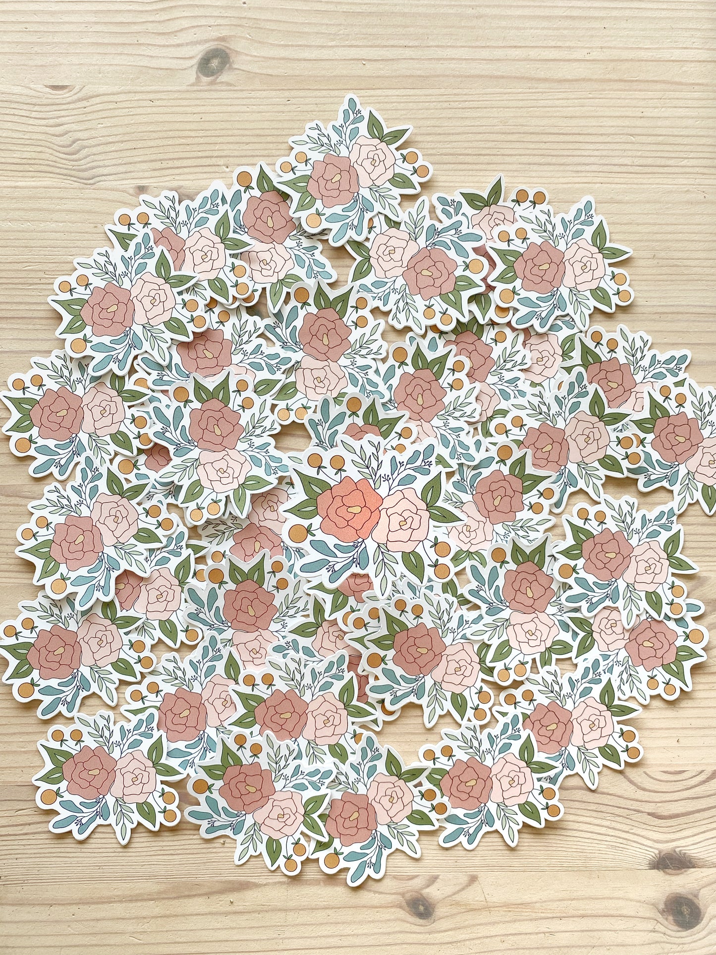 A product photo featuring a floral arrangement sticker.